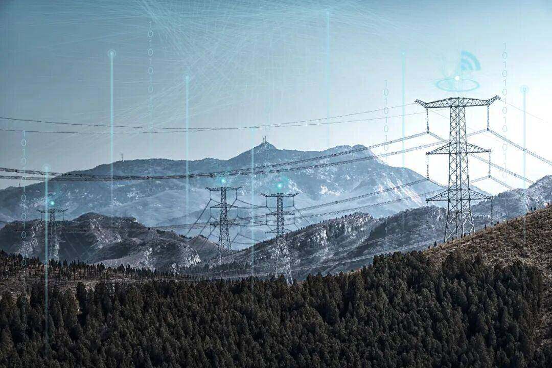 群山中的电力输送。图源：视觉中国。